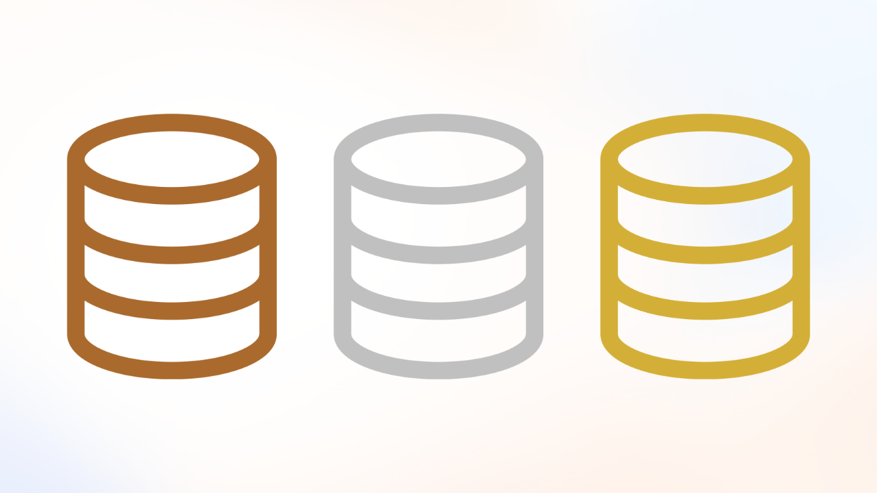 Three cylinder database icons in the colors bronze, silver, and gold